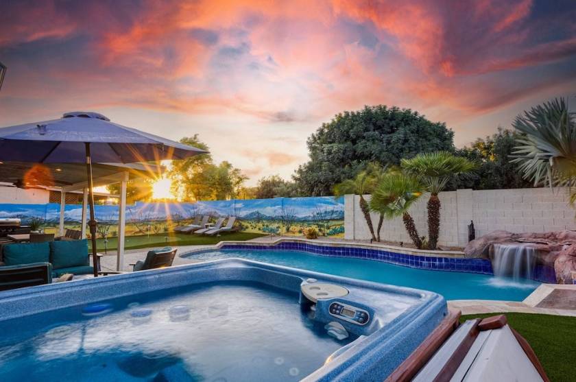 Vacation rental backyard with private hot tub and pool